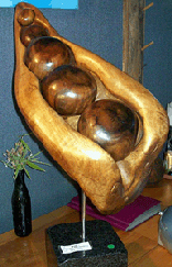 Stinkwood carving "The Pod" by Allan